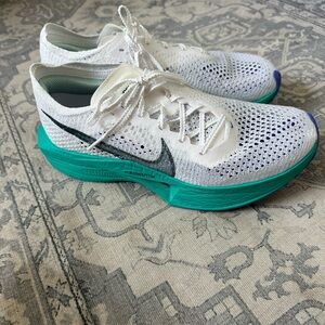 White and Teal Nike vaporfly women’s size 8.5 like new